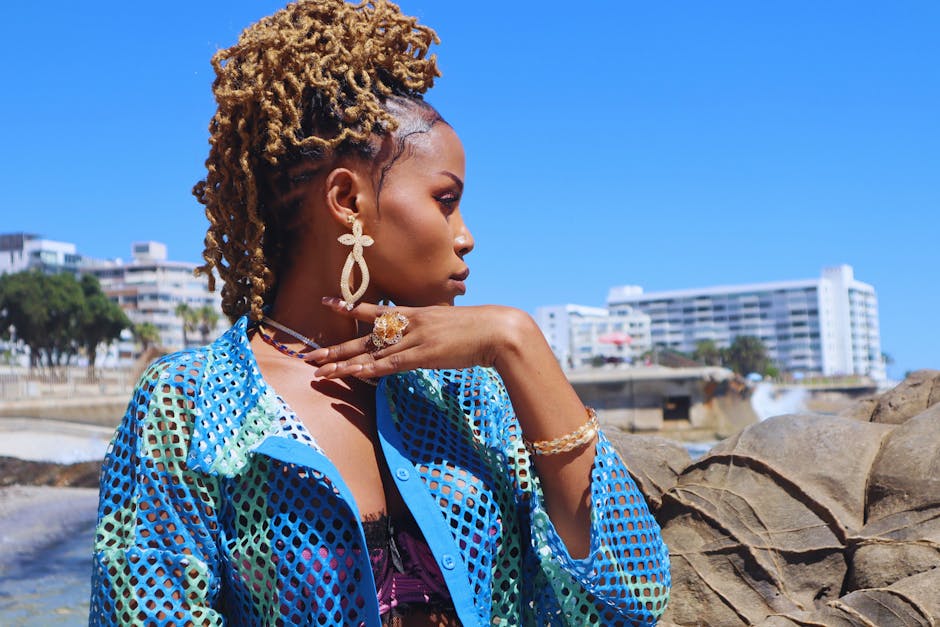 Portrait of a fashionable woman enjoying a sunny day on Cape Town's coast.