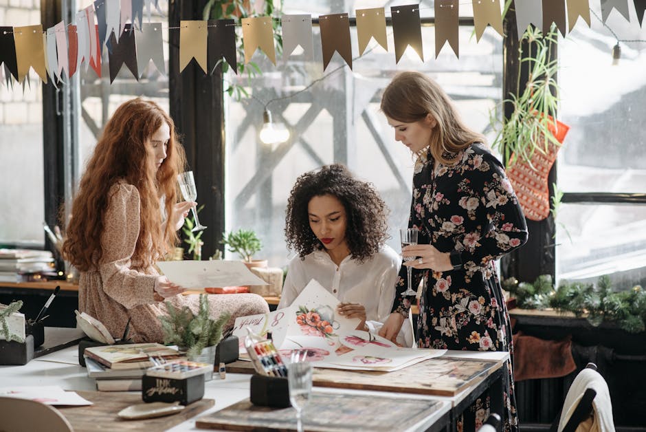 Artistic workshop featuring three women enjoying painting and drawing in a creative indoor setting.